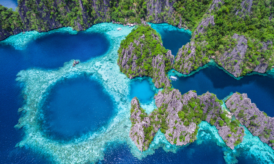 Coron, Palawan, Philippines, aerial view of beautiful lagoons and limestone cliffs