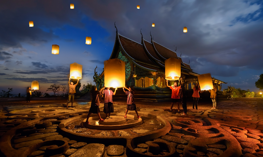People floating lamp in yeepeng festival at pagoda tree glow temple