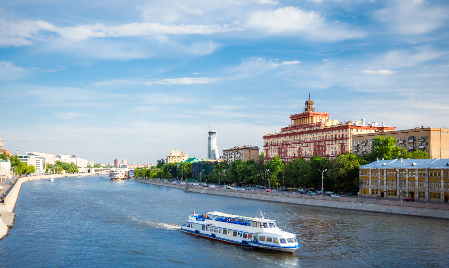 view of Moscow river with cruise boat in Moscow, Russia