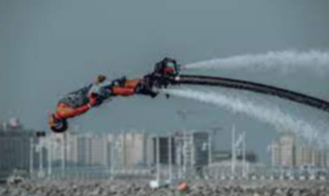 A Man on a Flyboard Making a Dive, UAE 
