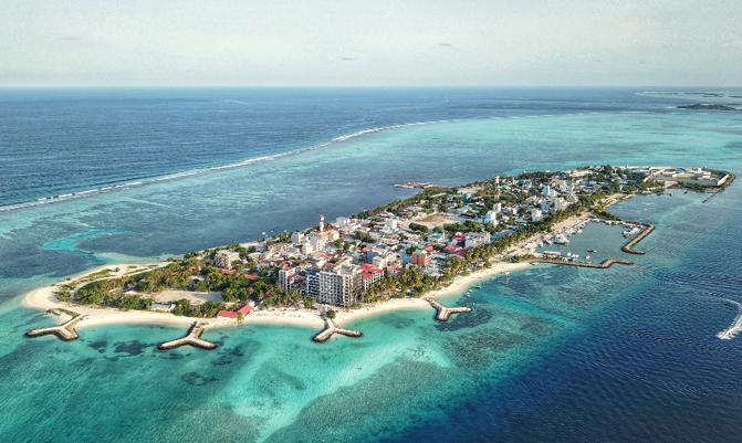 Aeriel view of Maafushi Island in Maldives. It is a public island which local staying but also open for tourist to spend their holiday in Maldives. 