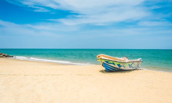 Beautiful Tropical Beach In Kalpitiya, Sri Lanka. These boats used to take people to watch dolphins