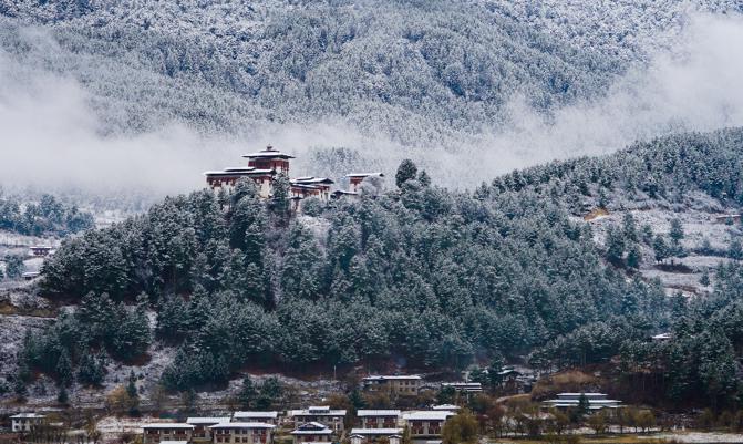 Jakar Dzong in Bumthang with view of beautiful valley.
