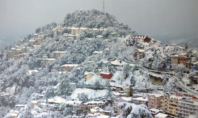 Shimla town in India covered with snowfall 