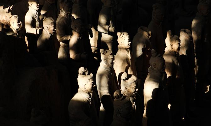 XIAN, CHINA - Famous Terracotta Army in Xi'an, China. The first Emperor of China contains collection of terracotta sculptures of armored men and horses.